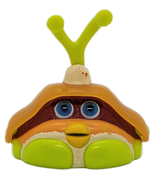 McDonald's Happy Meal Toy 2001 Tiger Action Toys #2 Shelby the Snail (Loose), front view of a colorful snail toy with blue eyes, a brown-and-orange shell, bright green body, and raised green antennae on a white background.