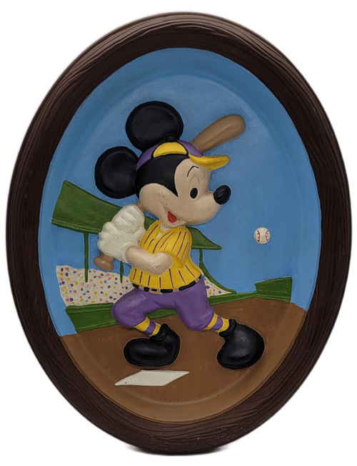 Walt Disney Productions Vintage Disney Mickey Mouse Playing Baseball 3D Plaster Wall Plaque Hand Painted, oval relief plaque featuring hand-painted Mickey Mouse in a yellow baseball uniform with a bat and baseball in a stadium scene