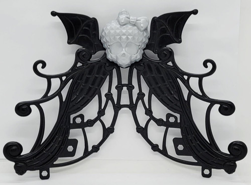 Mattel Monster High Dance The Fright Away Playset Replacement Skull Top Arch Gantry Part, black decorative arch with a white skull centerpiece, bat wings, and ornate scrollwork shown against a white background.