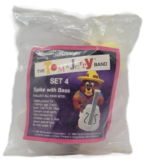 McDonald's Happy Meal Toy 1990 The Tom & Jerry Band Set 4 Spike With Bass, vintage sealed toy package showing Spike holding a white bass guitar and the original Set 4 label.