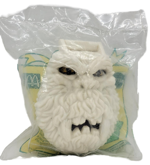 McDonald's Happy Meal Toy 1993 Mattel Totally Toy Holiday #8 Mighty Max Yeti, white shaggy Yeti figure with dark eyes and fangs sealed in its original clear plastic bag with colorful backing