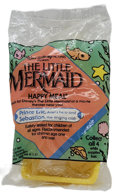 Disney McDonald's Happy Meal Toy 1989 Disney's The Little Mermaid #3 Prince Eric with Sebastian in Floating Boat, sealed vintage toy package featuring colorful Little Mermaid artwork and the Prince Eric and Sebastian label.