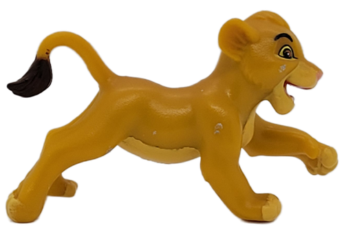 Vintage 1994 Disney The Lion King young Simba PVC figure in a running pose with raised tail