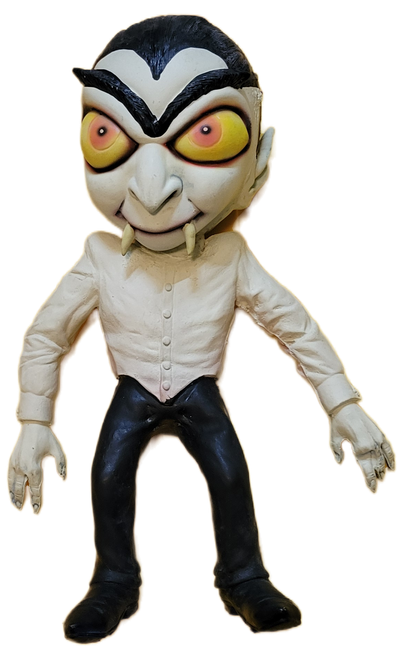Vintage 18-inch Paper Magic Group Dracula Halloween decoration with yellow eyes, fangs, white shirt and black trousers.