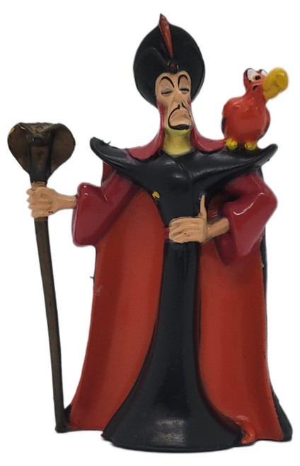 Mattel Vintage 1992 Disney Aladdin Jafar with Iago 3.25-inch PVC Figurine, close-up of Jafar in a red and black robe holding a staff with red parrot Iago perched on his shoulder against a white background.