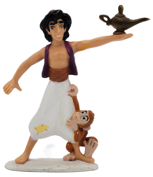 Vintage Mattel Disney Aladdin figurine holding the magic lamp with Abu clinging to his white pants