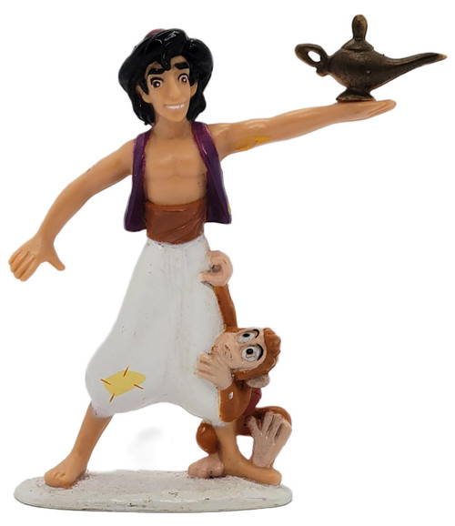 Mattel Vintage 1992 Mattel Disney Aladdin with Abu & Magic Lamp PVC Figurine – 3", 3-inch figurine showing Aladdin holding a magic lamp with Abu peeking from behind his leg on a white base