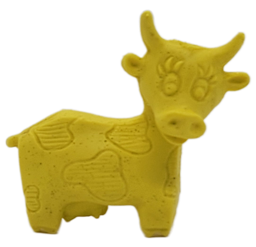 Vintage Diener yellow cow eraser showing cartoon face and molded spots