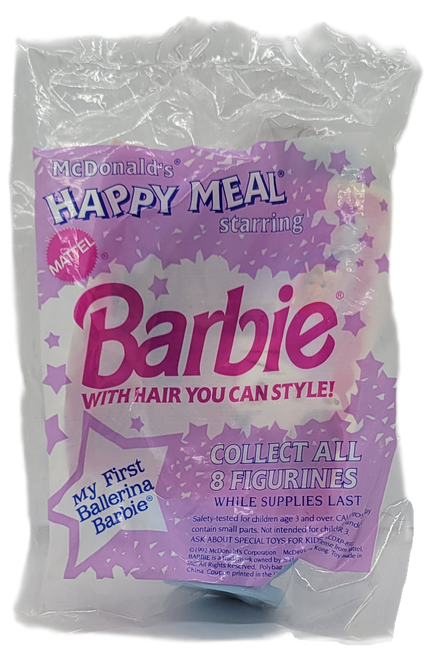 McDonald's Happy Meal toy of My First Ballerina Barbie with hair you can style from the 1993 Barbie/Hot Wheels series of toys. My First Ballerina Barbie is 4.5-inches tall and wearing a Purple Tutu.