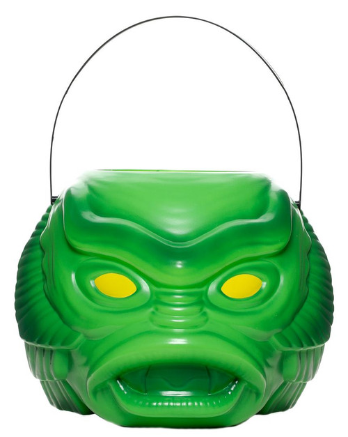 Universal Monsters Super7 The Creature From The Black Lagoon Super-bucket, a green plastic container designed as a monster face with yellow eyes and an open mouth.