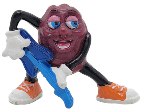Applause California Raisins 1988 California Raisins Hardee's Series 2 F.F. Strings Figure, a figurine of a raisin character with a smiling face, wearing orange shoes, blue shorts, and holding a saxophone to the ear.
