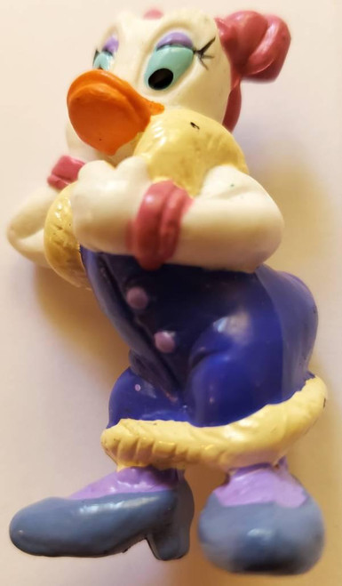Disney's Daisy Duck PVC Toy Figure, colorful cartoon character toy with big eyes, orange beak, pink bow, and purple shoes.