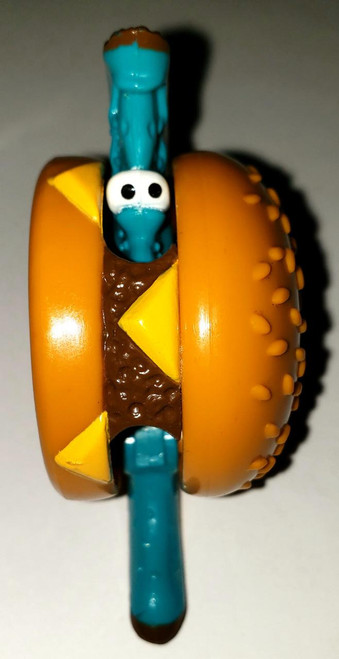 McDonald's Happy Meal Changeables - Series 3 Quarter Pounder with Cheese-O-Saur Toy, a toy shaped like a mini hamburger with a blue dinosaur figure emerging from the center.