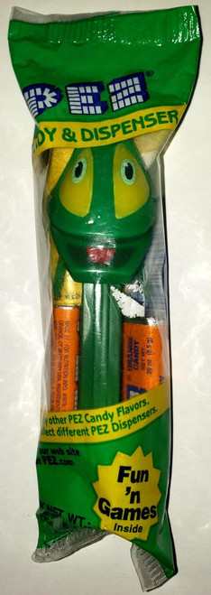 PEZ - Bugz Grasshopper Dispenser, a candy dispenser shaped like a green grasshopper with a smiling face, inside transparent packaging with colorful branding and fun game messages.