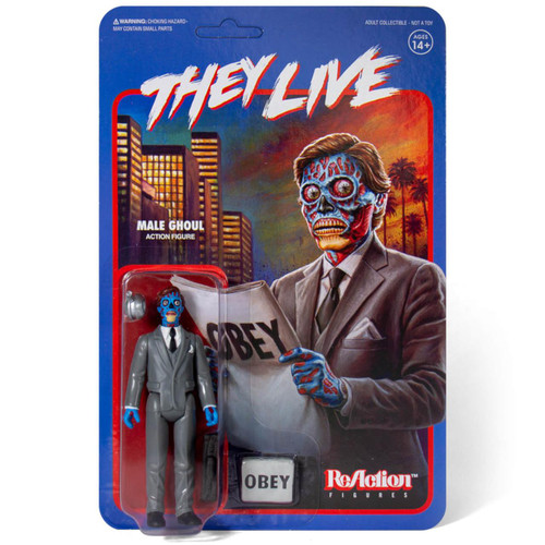 Super7 They Live - Male Ghoul Action Figure, articulated action figure dressed in gray suit with blue face and hands, holding a black briefcase, in blister pack with colorful retro-style background.