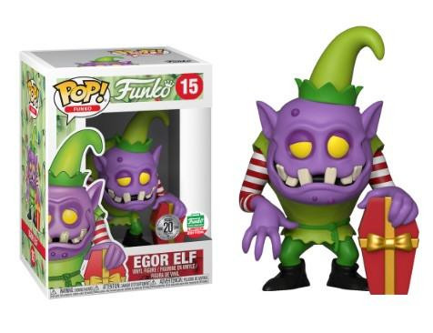 Funko POP! Funko: Spastik Plastik - Egor Elf #15, collectible vinyl figure of a purple elf with yellow eyes, striped shirt, green hat, and holding a gift box, in front of its retail box.