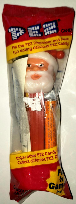 PEZ Santa C with Open Eyes Pez Dispenser, festive holiday candy dispenser with Santa Claus head design and open eyes, in red and white packaging.