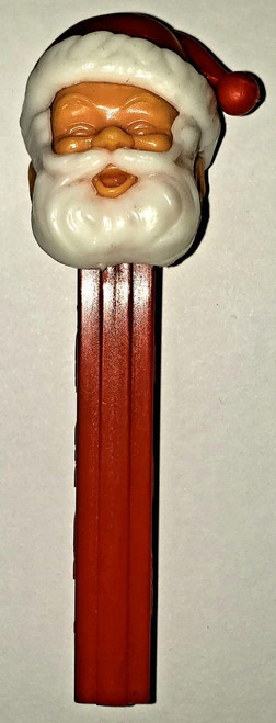 PEZ Santa C with Closed Eyes and NO Feet Pez Dispenser, featuring Santa's face with closed eyes, a white beard, and a red Santa hat, designed as a collectible holiday novelty.