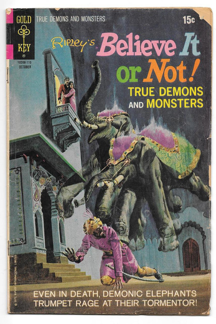 Gold Key Ripley's Believe It Or Not! True Demons And Monsters #10208-110 Comic Book, vintage comic book cover featuring a demon elephant attacking a man, with a woman on a balcony and a dark background.