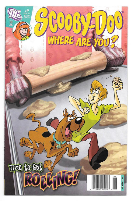 Scooby-Doo Where Are You? #4 Comic Book, cartoon image of Scooby-Doo and Shaggy running from a rolling log, with playful text 'Time to Get Rolling!'