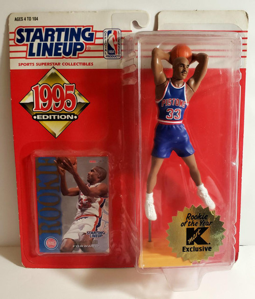 1995 Starting Lineup NBA Detroit Pistons Grant Hill Toy Figure, basketball player figurine wearing a Pistons uniform with the number 33 shooting a basketball.