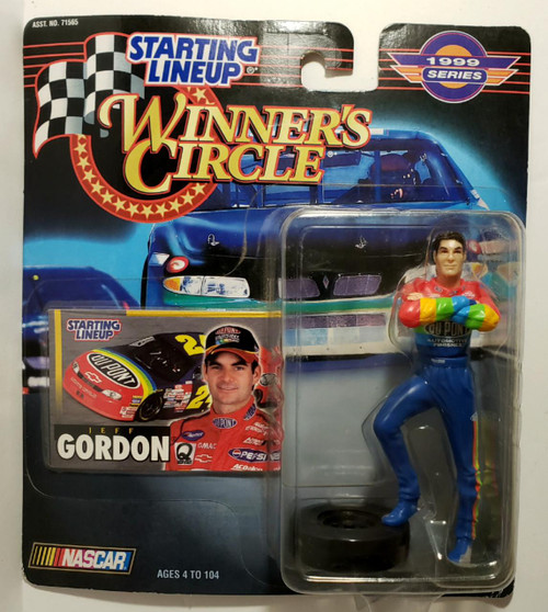 1999 Starting Lineup Winner's Circle Jeff Gordon NASCAR Toy Figure, detailed racing figure in colorful racing suit with arms crossed, displayed in original packaging with car image and Jeff Gordon's photo.