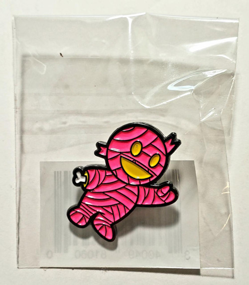 Super7 Mascot Pin (Pink), cute pink cartoon mascot pin with yellow eyes and smile in its original packaging
