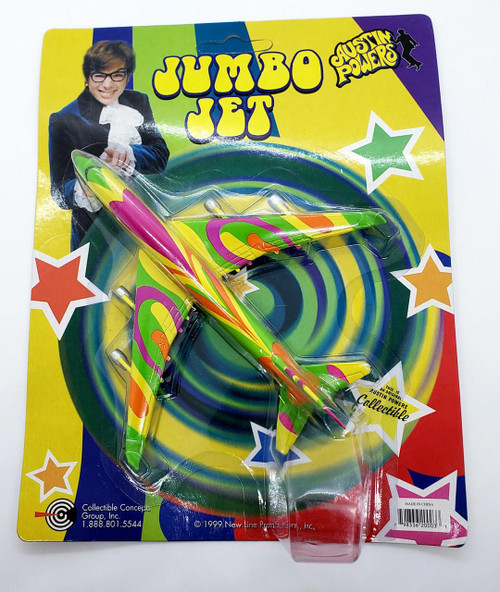 Austin Powers Jumbo Jet Die-Cast, colorful miniature toy airplane in vibrant pink, yellow, green, and orange with a psychedelic pattern, in its original packaging.