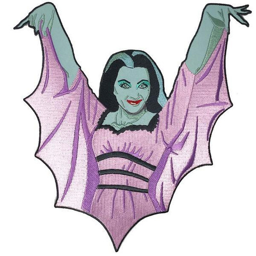 Munsters Lily Munster Iron-on Back Patch, embroidered patch featuring Lily Munster with black hair, greenish skin, and pink dress with bat wings design.