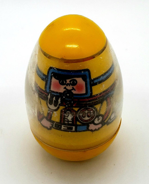 Hasbro Weebles - 1976 Scuba Diver, vintage yellow toy with illustrated scuba diver character on its front.