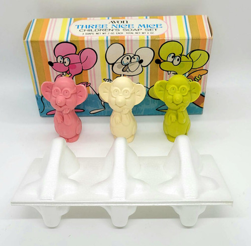 AVON Vintage AVON Three Nice Mice Children's Soap Set, colorful mouse-shaped soaps in pink, white, and yellow colors with a carton box in the background illustrating cartoon mice characters.