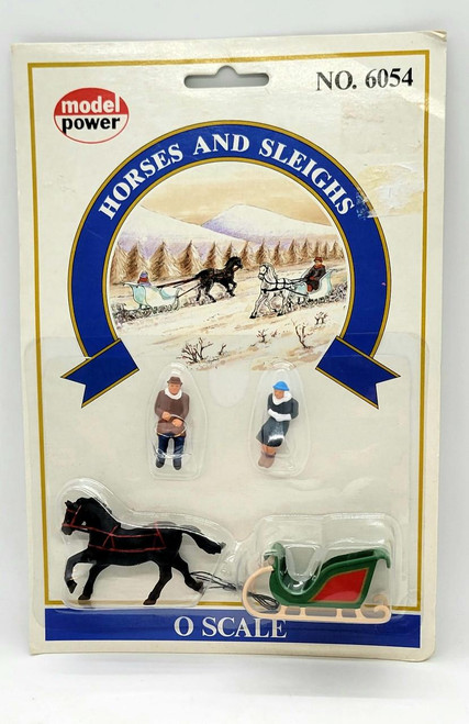 Model Power O Scale NO 6054 Horses And Sleighs Train Accessory, vintage toy set featuring horses, sleighs, and miniature figurines, suitable for model train displays.