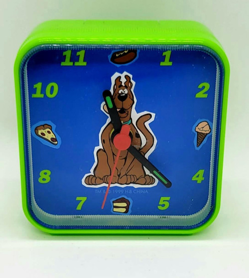 Scooby-Doo! Quartz Alarm Clock, colorful square clock with Scooby-Doo character and themed icons on blue background.