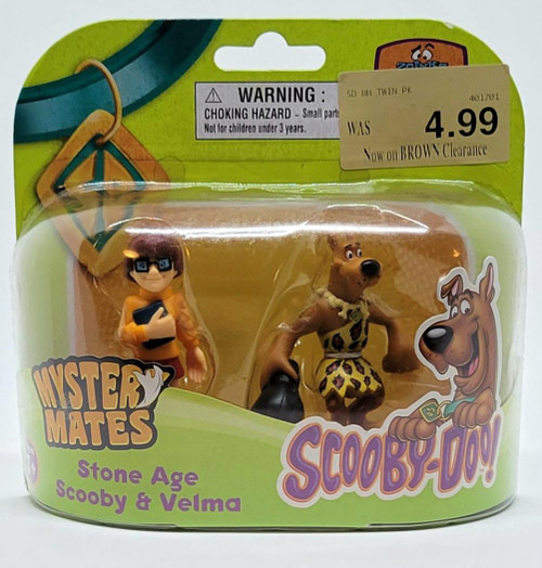 Charter Ltd. Scooby-Doo! Mystery Mates Stone Age Scooby & Velma Toy Figures, plastic figurines of Scooby-Doo and Velma in Stone Age outfits in packaging with colorful design and branding.