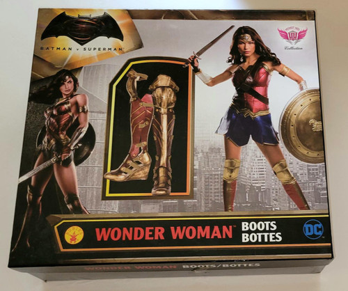 Wonder Woman 3Piece Wedge Boots - Size 10, packaging with an image of Wonder Woman in costume holding a sword and shield, featuring the boots with gold and red detailing.