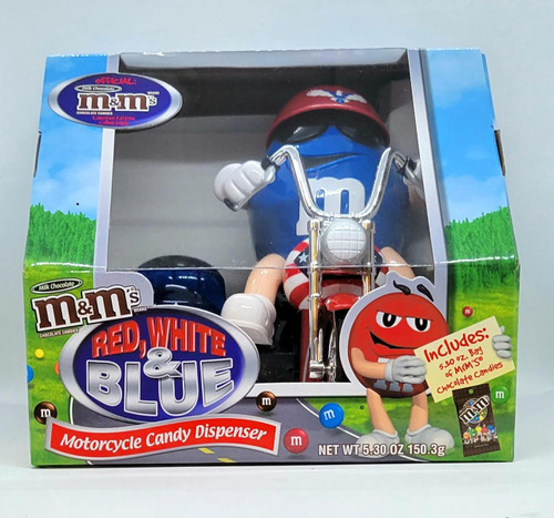 M&M's Dispenser - Red, White & Blue Motorcycle Candy Dispenser, toy motorcycle modeled as an M&M's character in red, blue, and white colors with accessories, inside a colorful retail box.