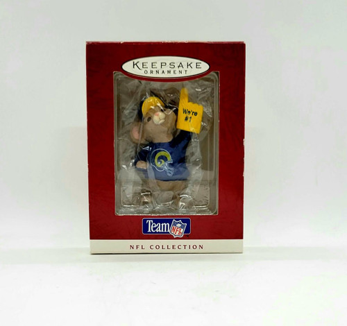 Hallmark Keepsake Ornament 1996 NFL St. Louis Rams, a collectible plush toy in a team jersey with a yellow foam finger and football helmet, in its original packaging with a clear front displaying the ornament.