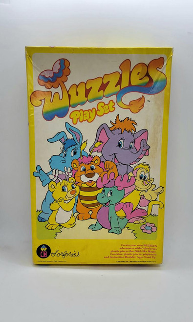 Colorforms: Wuzzles Playset, colorful board game featuring characters from The Wuzzles series with plastic pieces for creating adventures.