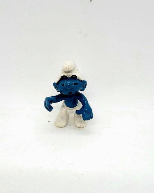 Smurfs Vintage PEYO 4.0229 Piano Smurf PVC Figure, collectible blue and white Smurf toy with a hat, in a standing pose.