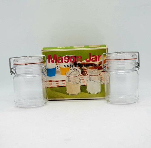 Unbranded Vintage Mason Jar Salt & Pepper Shaker Set, clear glass shakers with metal wire handles and orange rubber seals, packaged with a colorful box.