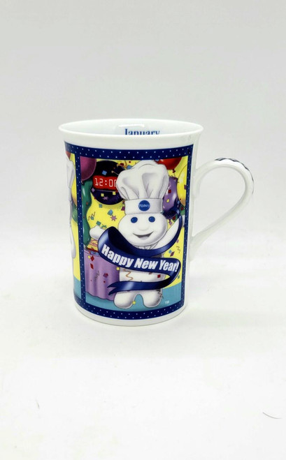 Pillsbury Doughboy Fine Porcelain Collector Mug, January New Year's Celebration, featuring a cheerful Doughboy wearing a chef's hat with a 'Happy New Year!' message and festive party decorations.
