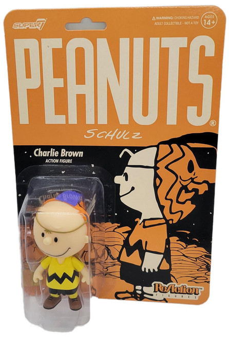 Super7 Peanuts ReAction Figure Wave 4 - Masked Charlie Brown, collectible toy featuring Charlie Brown in his iconic yellow shirt with black zigzag pattern and a mask, packaged in original blister pack with Peanuts branding.