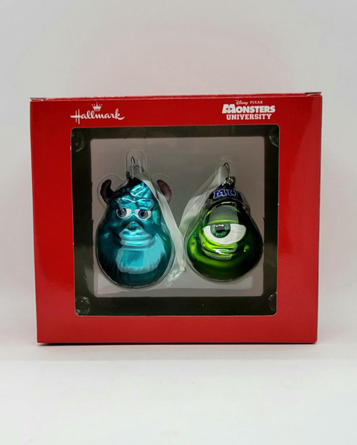 Hallmark Disney Pixar Monsters University Blown Glass Christmas Tree Ornaments, featuring Mike Wazowski and James P. Sullivan designed as blown glass ornaments in a red packaging box.