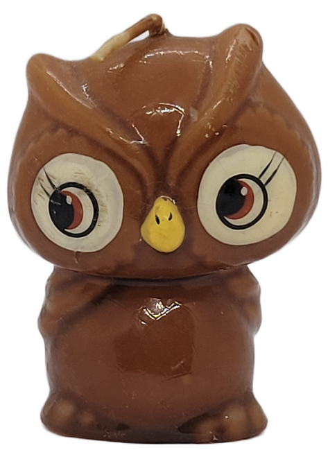 Russ Berrie brown owl candle with oversized eyes and yellow beak, front view.