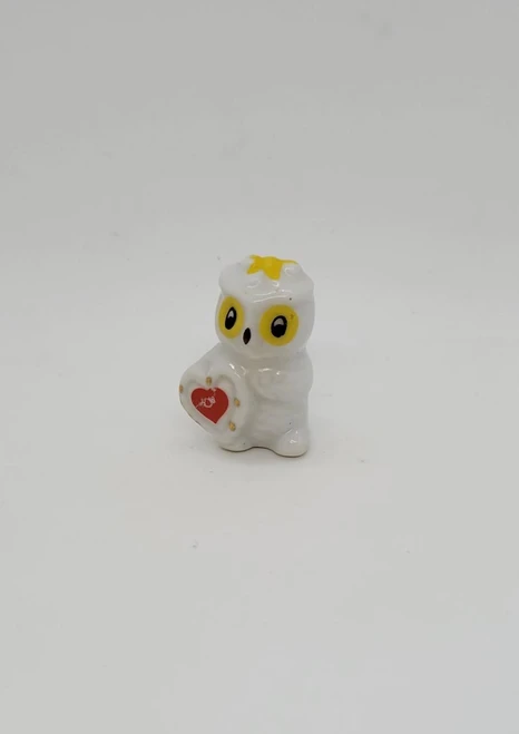Unbranded Vintage Little White Owl With Yellow Bow Holding Heart Figurine, adorable ceramic owl with yellow bow and heart-shaped object in its wing.