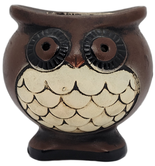 Brown and cream ceramic owl candle holder with large round eyes and scalloped feather chest, measuring 3 inches tall and wide.