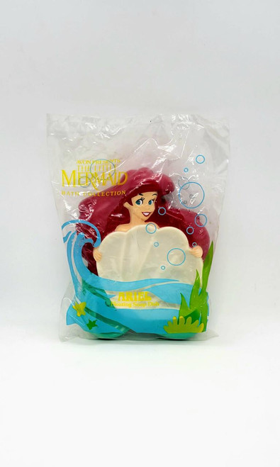 Disney AVON The Little Mermaid Bath Collection: Ariel Floating Soap Dish, waterproof soap dish featuring Ariel the mermaid with red hair inside clear plastic packaging with aquatic-themed design.