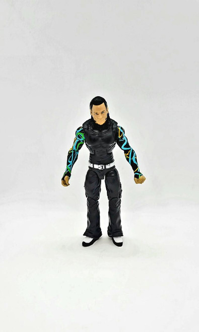 WWE 2011 Jeff Hardy Action Figure (Loose), detailed figure with black clothing and colorful arm tattoos, standing upright against a plain white background.
