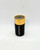 AVON Duracell Battery, black and gold cylindrical battery with the brand name printed on the side.