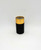 AVON Duracell Battery AVON After Shave, black and gold cylindrical battery with a flat top, isolated on white background.